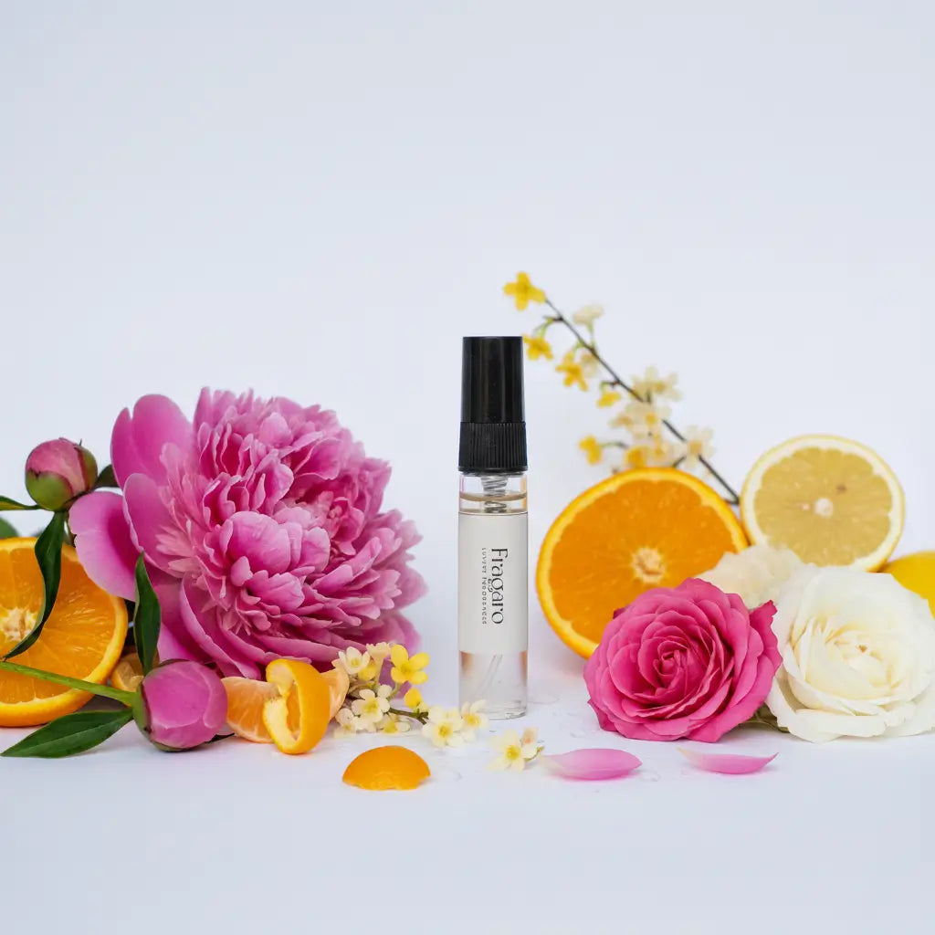 Clementine 5ml perfume tester with ingredients around the bottle.